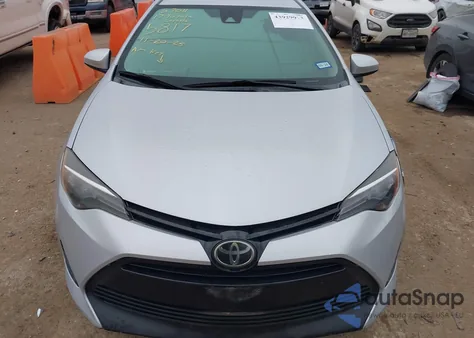 2017 Toyota Corolla Le z USA, uszkodzony, nr VIN 2T1BURHEXHC835817